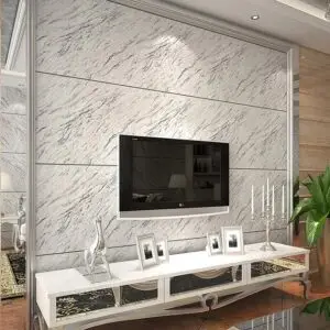 Percantik Kamar Homestay Anda dengan Dinding Marmer 2 Marmer menjadi lapisan dinding background TV. Sumber: kumparan.com